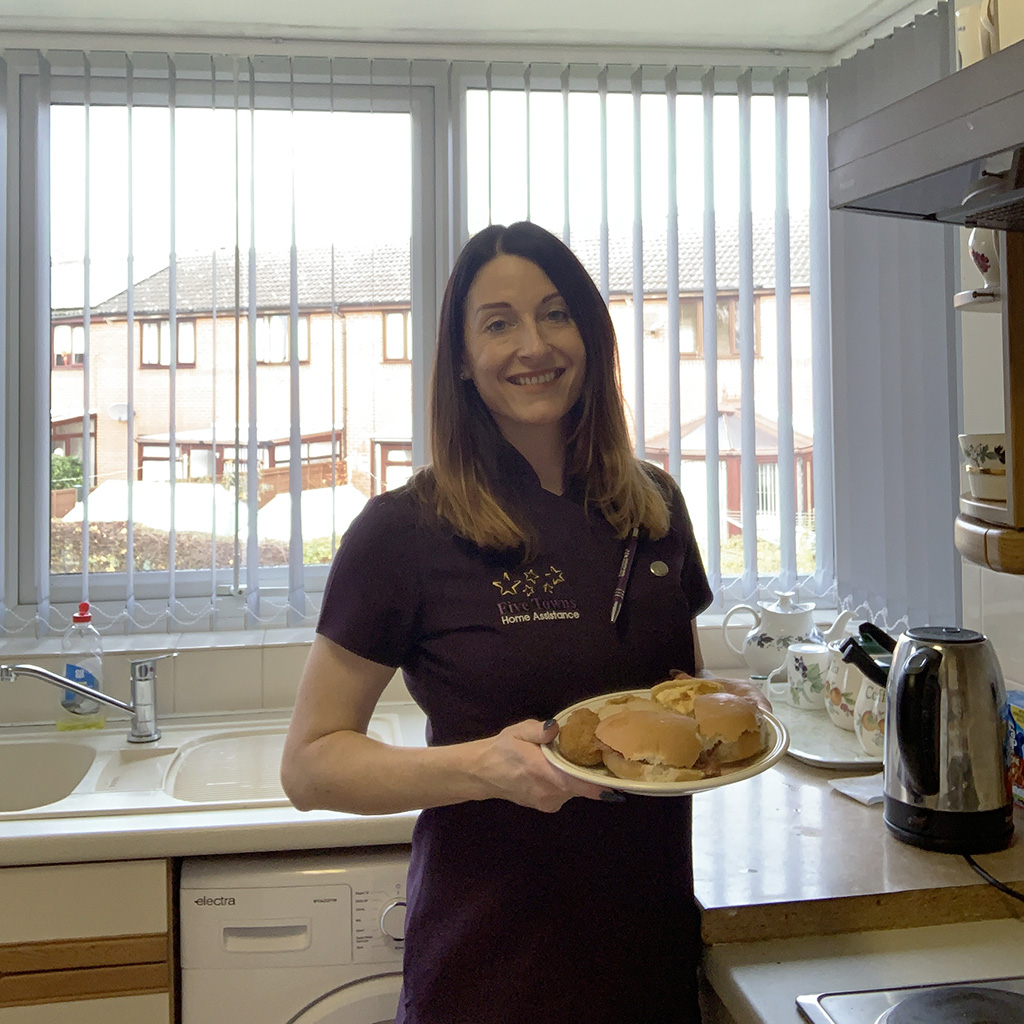 Hayley preparing lunch for one of our clients.